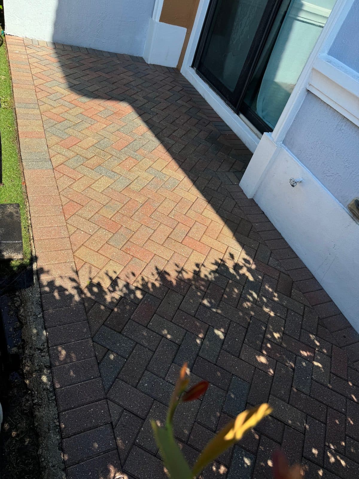 Restored herringbone brick paver patio